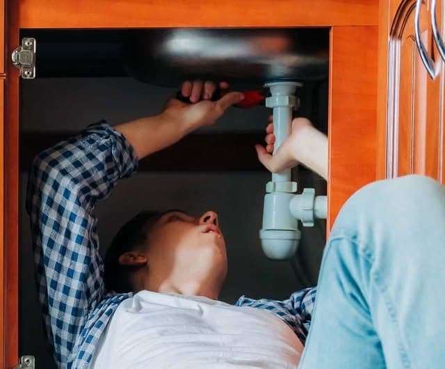 Close-up of a household fixture being diagnosed